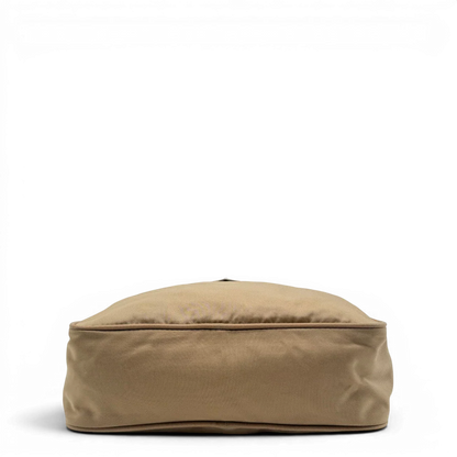 https://cdn.shopify.com/s/files/1/0564/9376/8855/files/Prada_Umhangetasche_rechteckig_small_aus_Nylon_hellbraun_5.webp?v=1782311804