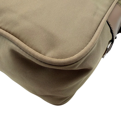 https://cdn.shopify.com/s/files/1/0564/9376/8855/files/Prada_Umhangetasche_rechteckig_small_aus_Nylon_hellbraun_8.webp?v=1782311805