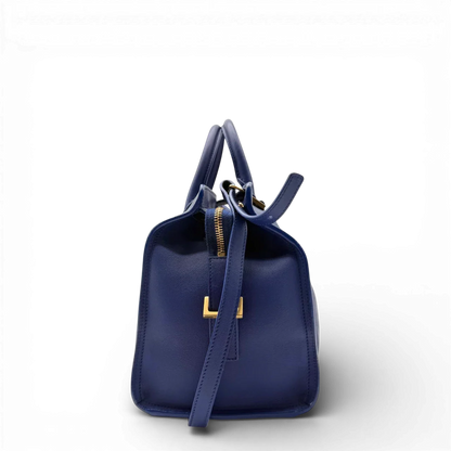 https://cdn.shopify.com/s/files/1/0564/9376/8855/files/Saint_Laurent_Handtasche_Cabbas_mit_Umhangegurt_aus_Leder_blau_vintage2604.webp?v=1773312218
