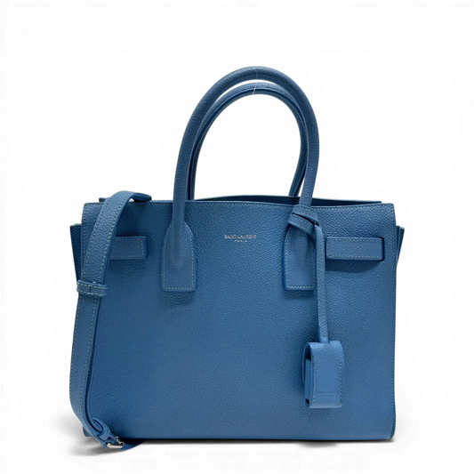 https://cdn.shopify.com/s/files/1/0564/9376/8855/files/Saint_Laurent_Handtasche_Sac_de_Jour_Nano_Leder_hellblau_vintage0122.webp?v=1775655025