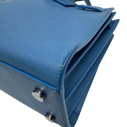 https://cdn.shopify.com/s/files/1/0564/9376/8855/files/Saint_Laurent_Handtasche_Sac_de_Jour_Nano_Leder_hellblau_vintage0128.webp?v=1775655025