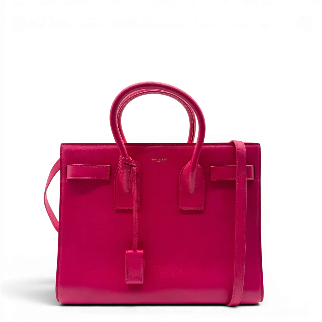 https://cdn.shopify.com/s/files/1/0564/9376/8855/files/Saint_Laurent_Handtasche_Sac_de_Jour_medium_aus_Leder_pink_vintage_YSL7099.webp?v=1779895630