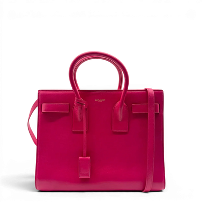 https://cdn.shopify.com/s/files/1/0564/9376/8855/files/Saint_Laurent_Handtasche_Sac_de_Jour_medium_aus_Leder_pink_vintage_YSL7099.webp?v=1779895630