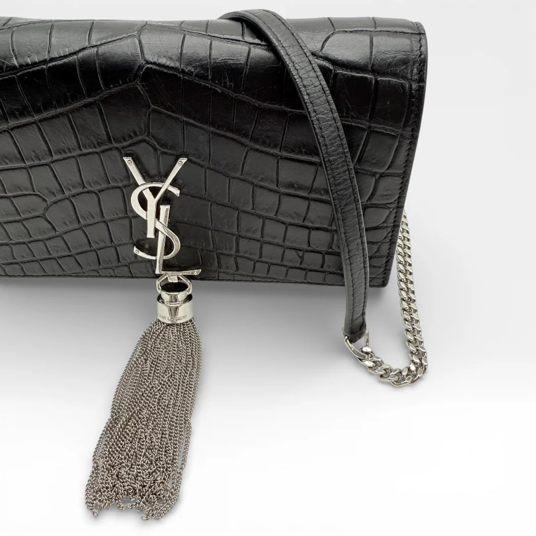 https://cdn.shopify.com/s/files/1/0564/9376/8855/files/Saint_Laurent_Umhaengetasche_Kate_Tassel_Small_Croco_schwarz_vintage_8952.webp?v=1769160153
