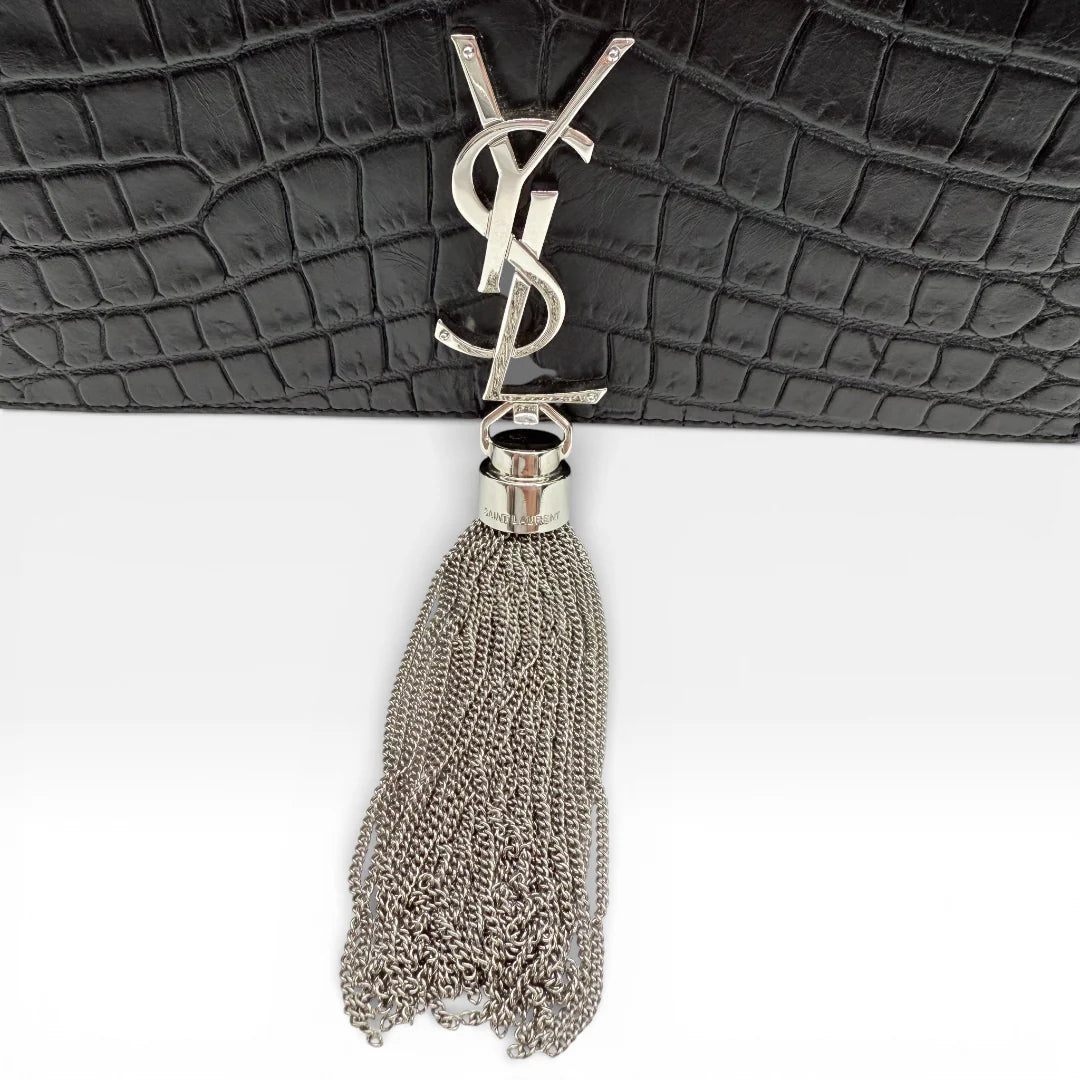 https://cdn.shopify.com/s/files/1/0564/9376/8855/files/Saint_Laurent_Umhaengetasche_Kate_Tassel_Small_Croco_schwarz_vintage_8955.webp?v=1769160154