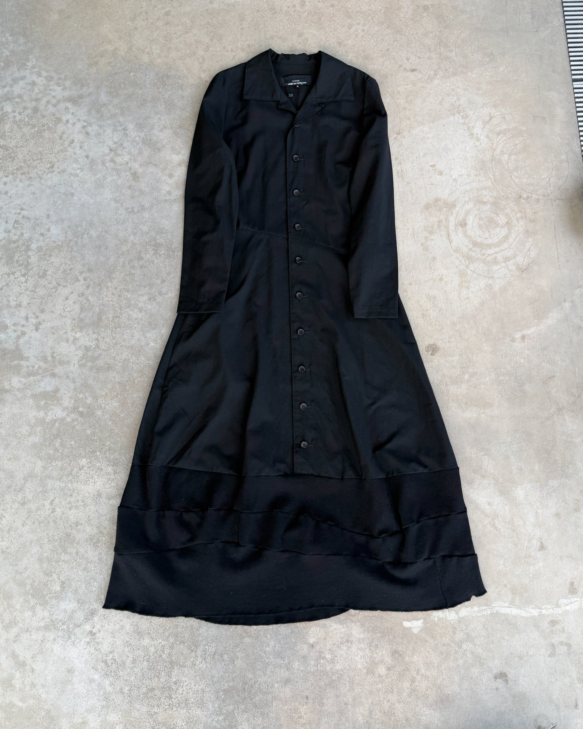 Comme des Garçons Tricot FW93 Wool Overcoat Dress – M-on a concrete background