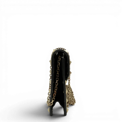 https://cdn.shopify.com/s/files/1/0564/9376/8855/files/Valentino_Garavani_Umhangetasche_Envelope_Rockstud_aus_Leder_schwarz_vintage7522.webp?v=1779405561