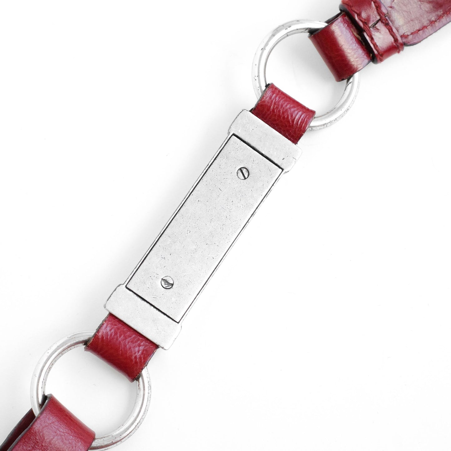 Yves Saint Laurent SS 2002 Tom Ford era red leather mombasa sling bag with a half-moon shape, chain leather strap and top zip closure. Available at Artefact Archive.