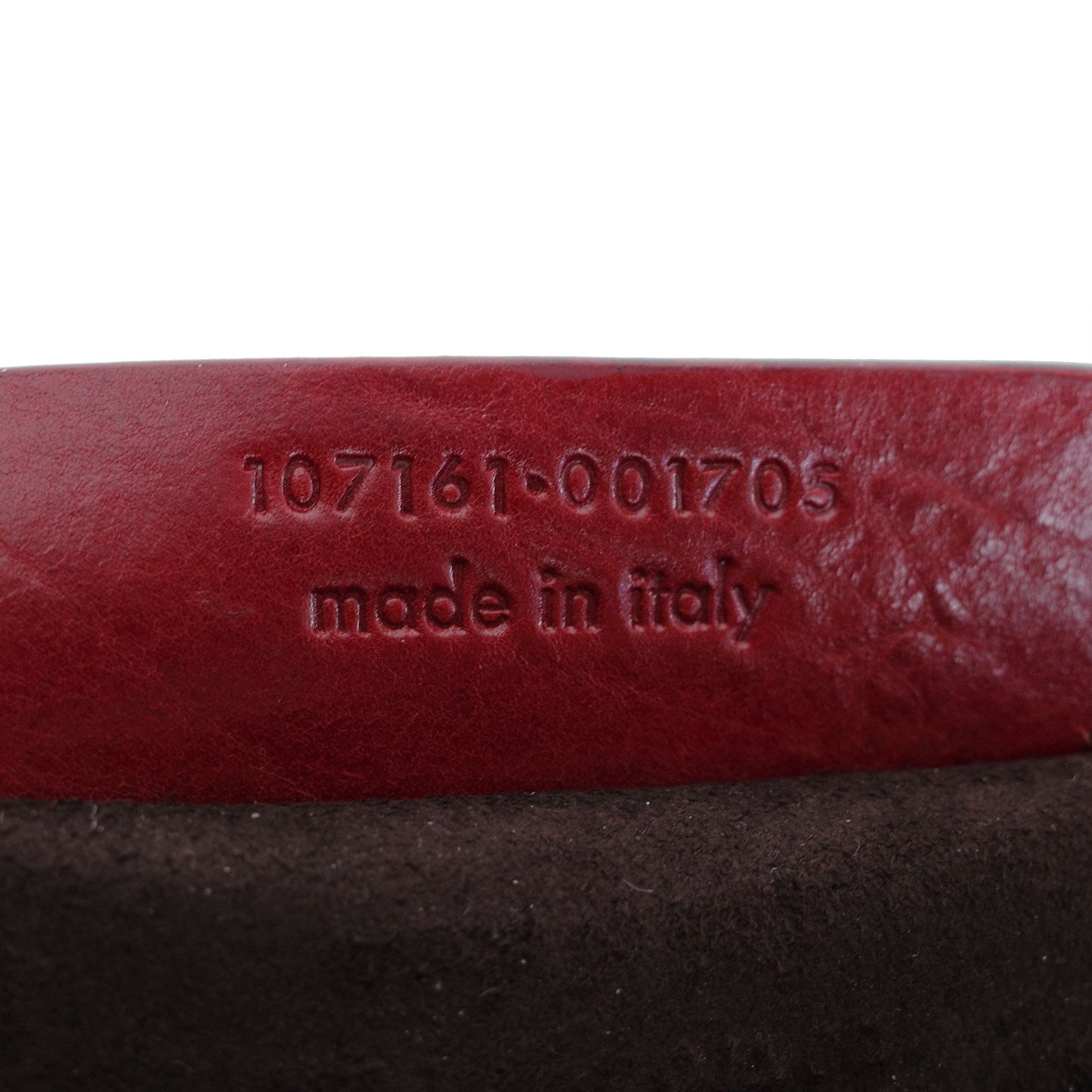 Yves Saint Laurent SS 2002 Tom Ford era red leather mombasa sling bag with a half-moon shape, chain leather strap and top zip closure. Available at Artefact Archive.