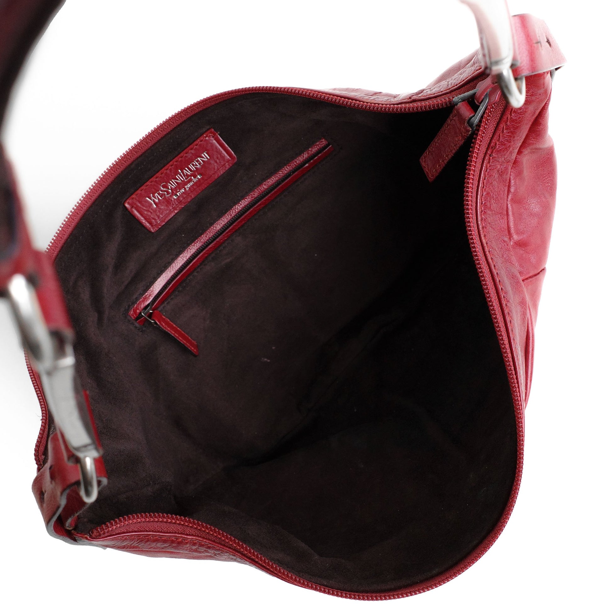 Yves Saint Laurent SS 2002 Tom Ford era red leather mombasa sling bag with a half-moon shape, chain leather strap and top zip closure. Available at Artefact Archive.