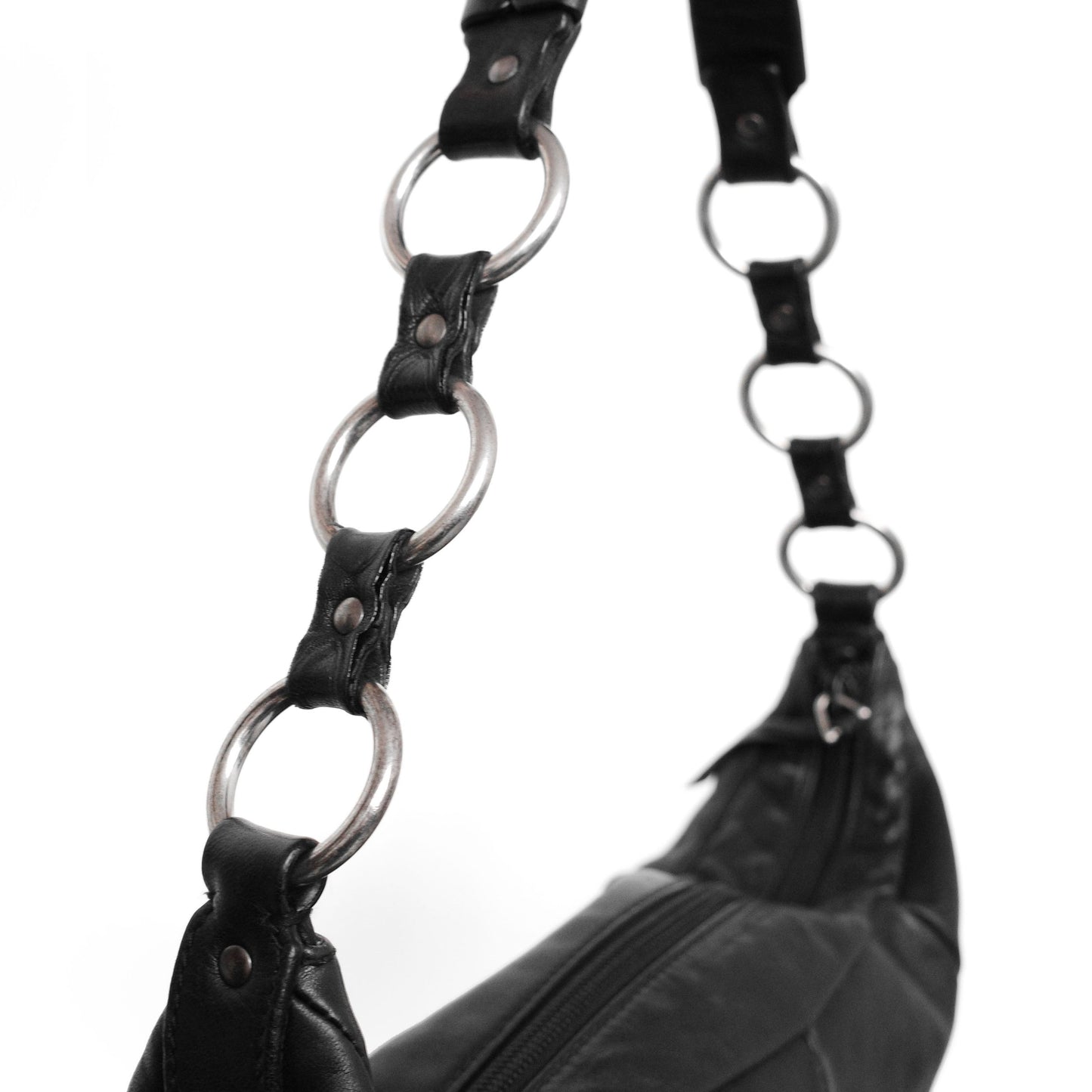 Yves Saint Laurent SS 2002 Tom Ford era leather mombasa sling bag with a half-moon shape, chain leather strap and top zip closure. Available at Artefact Archive.