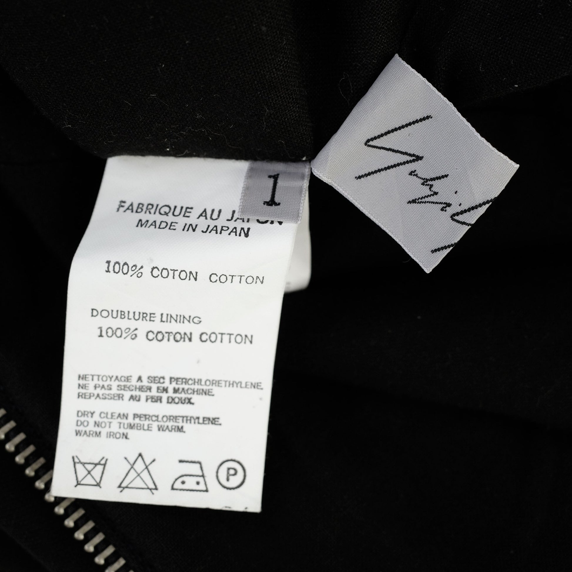 Yohji Yamamoto SS 2000 jacket with mid length sleeves, double zip closure, fitted waist and peplum hem. Size JPN 1 / XS-S. Available at Artefact Archive.