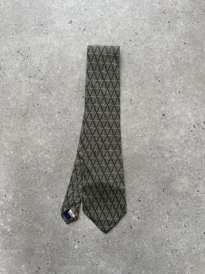 Guess 1990s pure silk print tie featuring vibrant patterns, shown laid flat with detailed close-up of fabric and design.