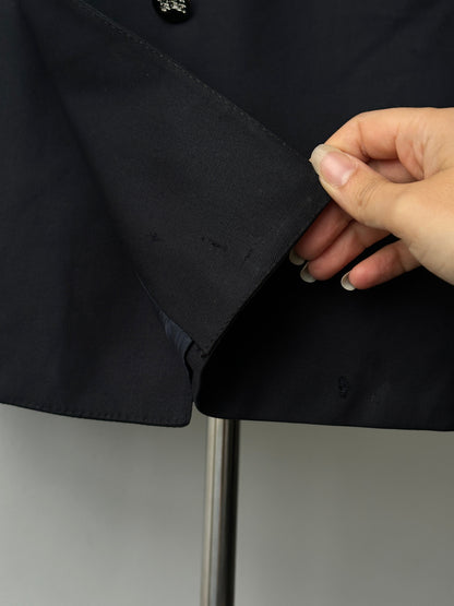 Burberry 1980s pure wool double-breasted blazer in size 46R, tailored with classic button details and vintage style.