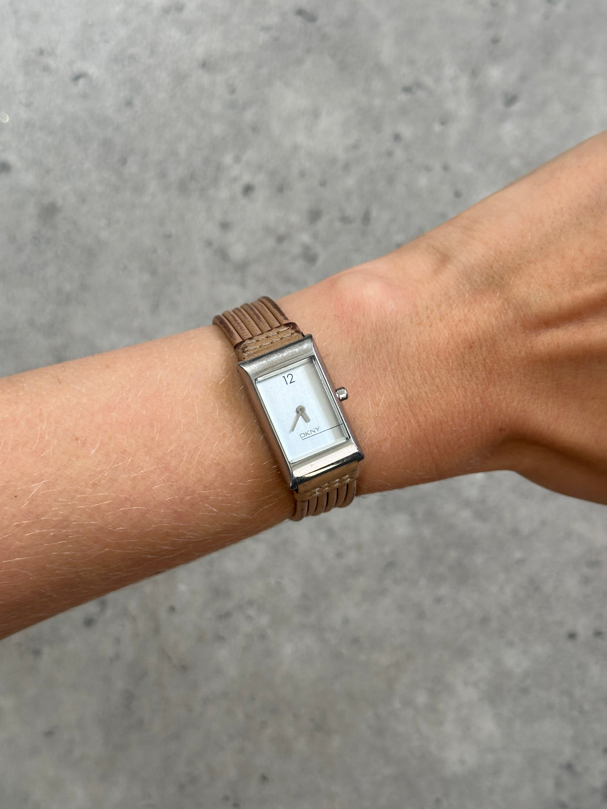 Donna Karran DKNY 2000s leather rectangular quartz watch with a sleek design and silver-tone dial.