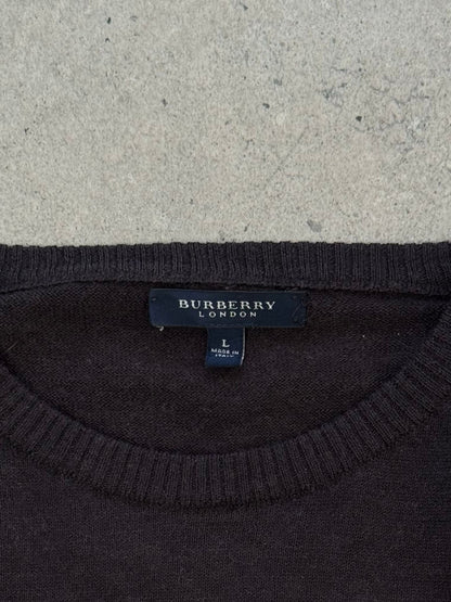 Burberry London 2000s wool knit jumper in size M, featuring classic design and textured knit pattern, displayed on a neutral background.