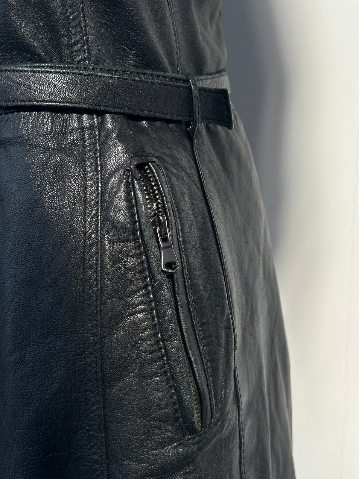 Vintage Italian 1990s double zip leather jacket with belt, XS size, featuring classic distressed leather and retro style.