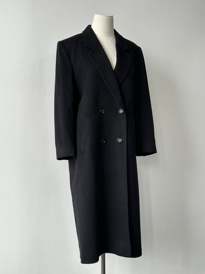 Vintage 1990s pure cashmere double-breasted coat, stylish and warm, shown in classic design with a tailored fit in a natural pose.