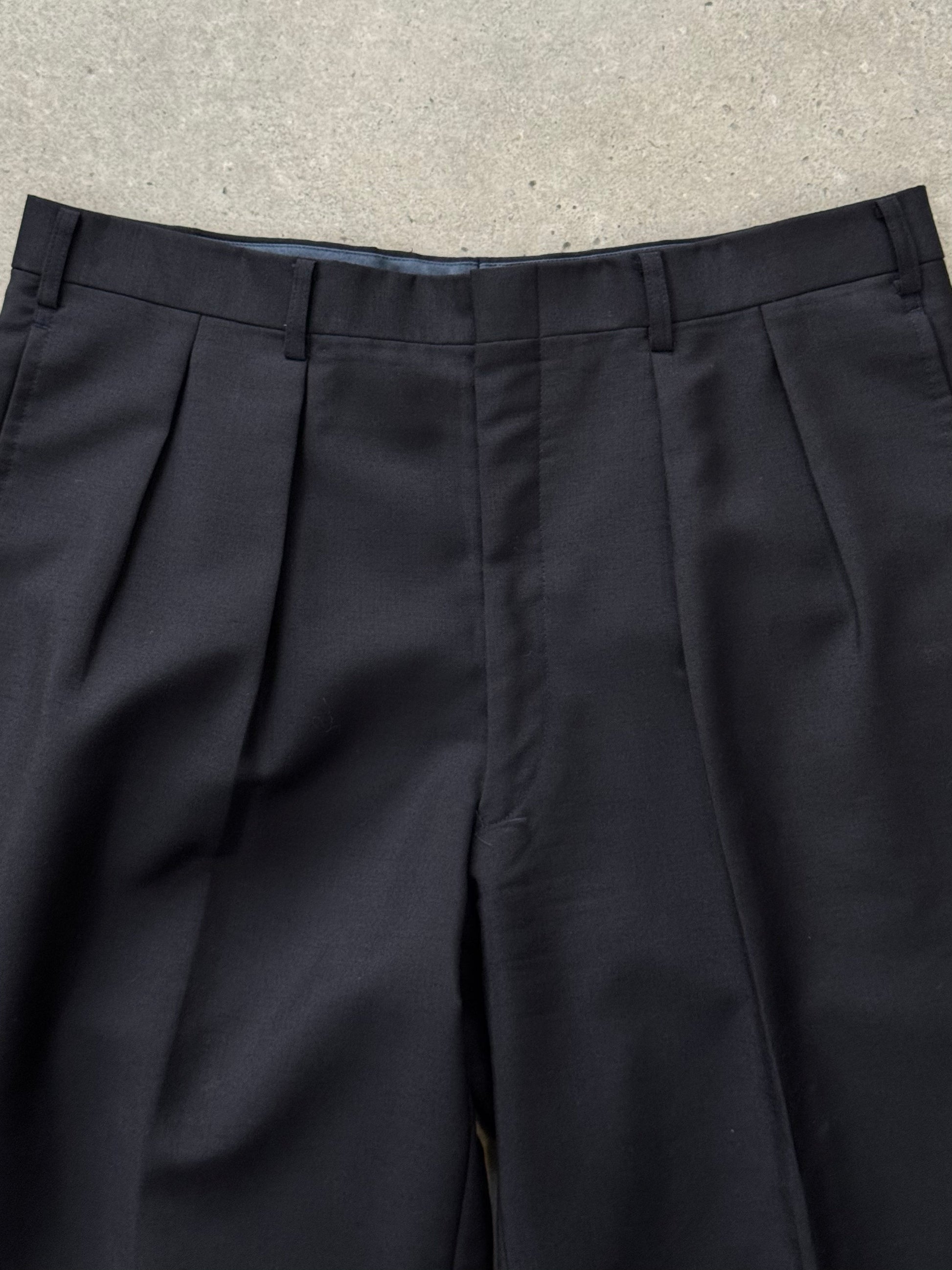 Vintage 1990s wool mohair pleated trousers in W34, showcasing classic tailored style and textured fabric.