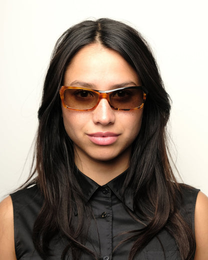 https://cdn.shopify.com/s/files/1/0818/5459/5398/files/alain-mikli-alain-mikli-asymmetrical-sunglasses-vintage-su475-1729844.jpg?v=1778953734