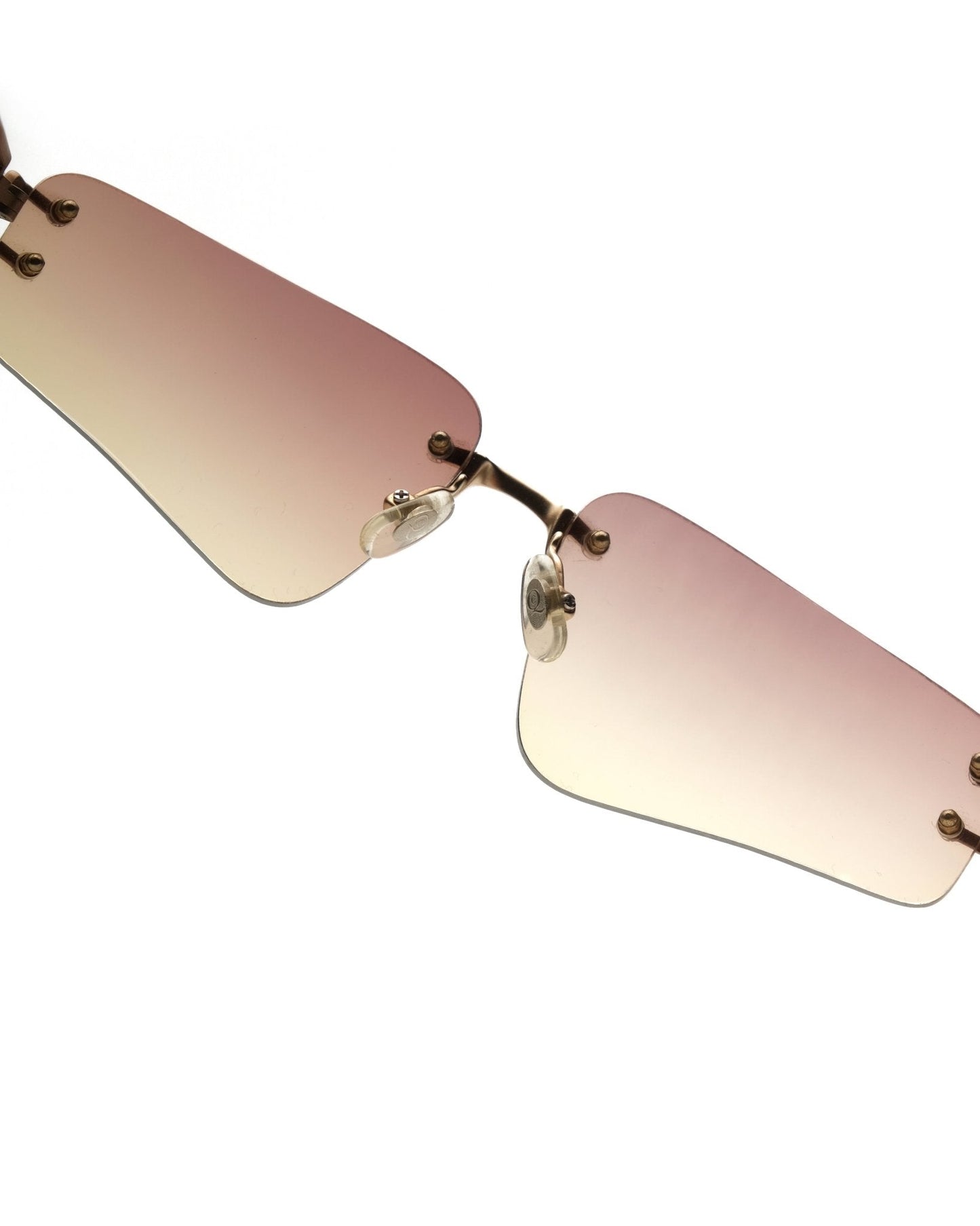 https://cdn.shopify.com/s/files/1/0818/5459/5398/files/alexander-mcqueen-alexander-mcqueen-rimless-sunglasses-vintage-su420-1202011.jpg?v=1770139715