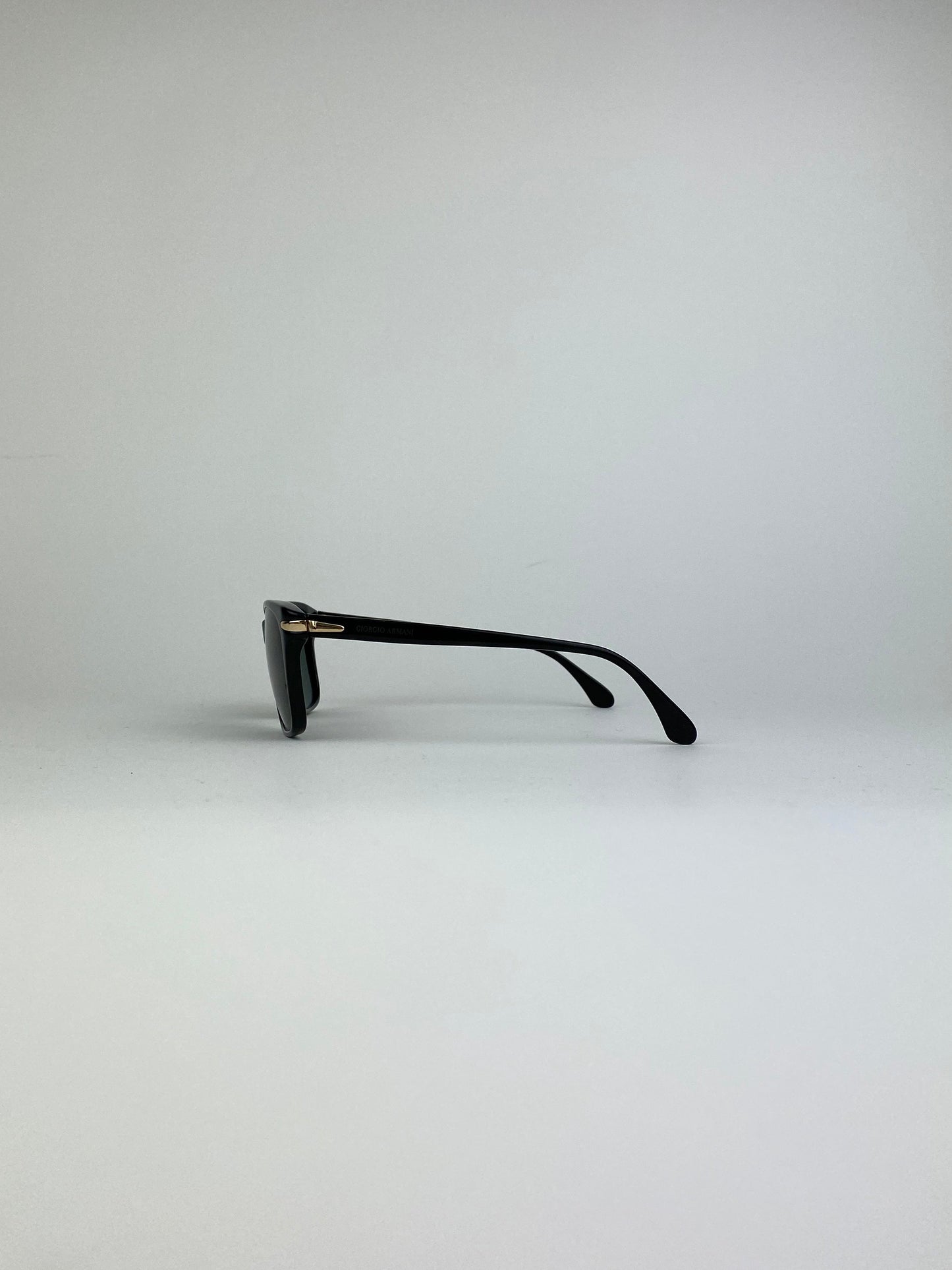 Black Giorgio Armani Wayfarer sunglasses with sleek frame and tinted lenses, stylish and timeless eyewear for men and women.