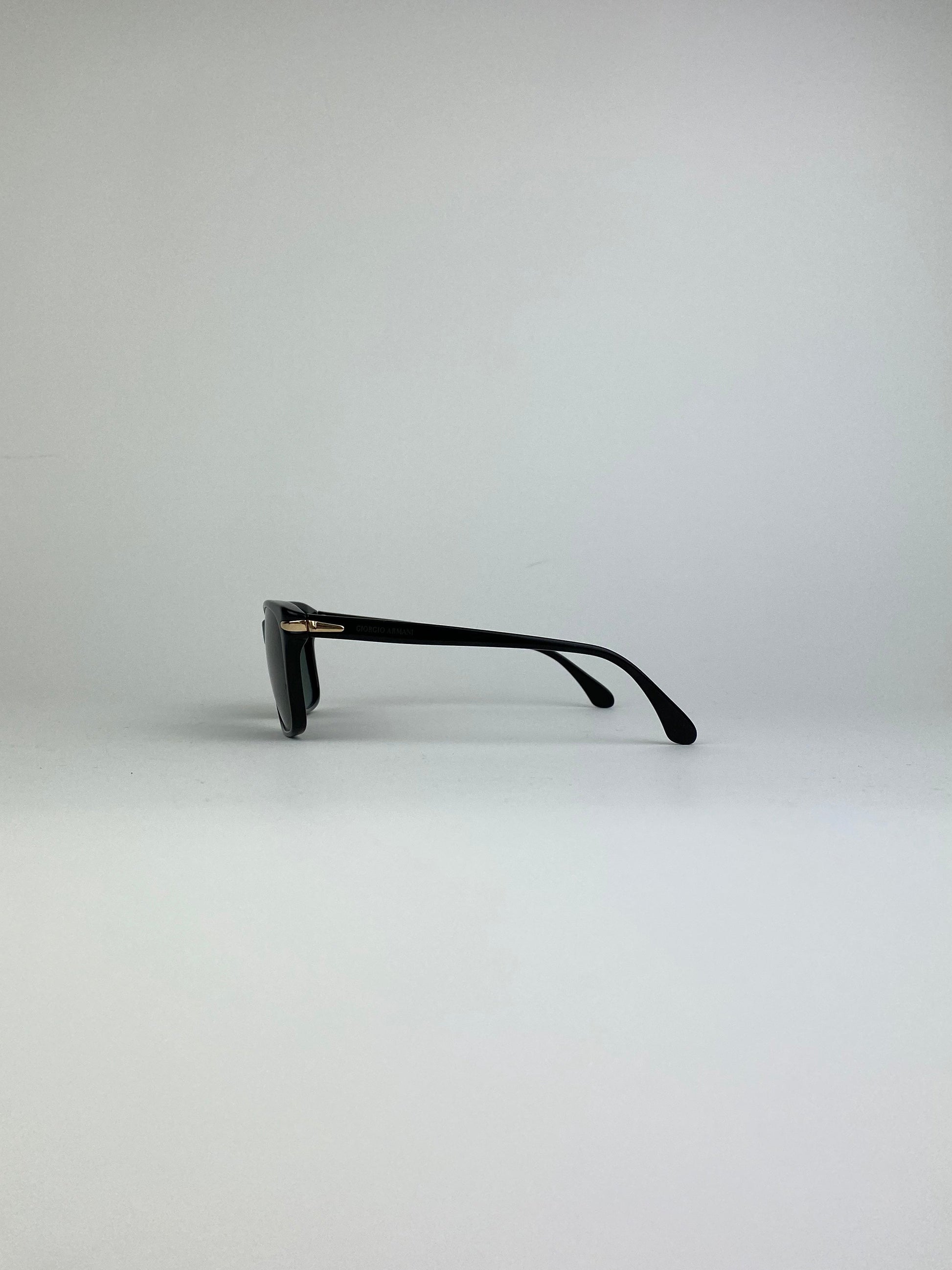 Black Giorgio Armani Wayfarer sunglasses with sleek frame and tinted lenses, stylish and timeless eyewear for men and women.
