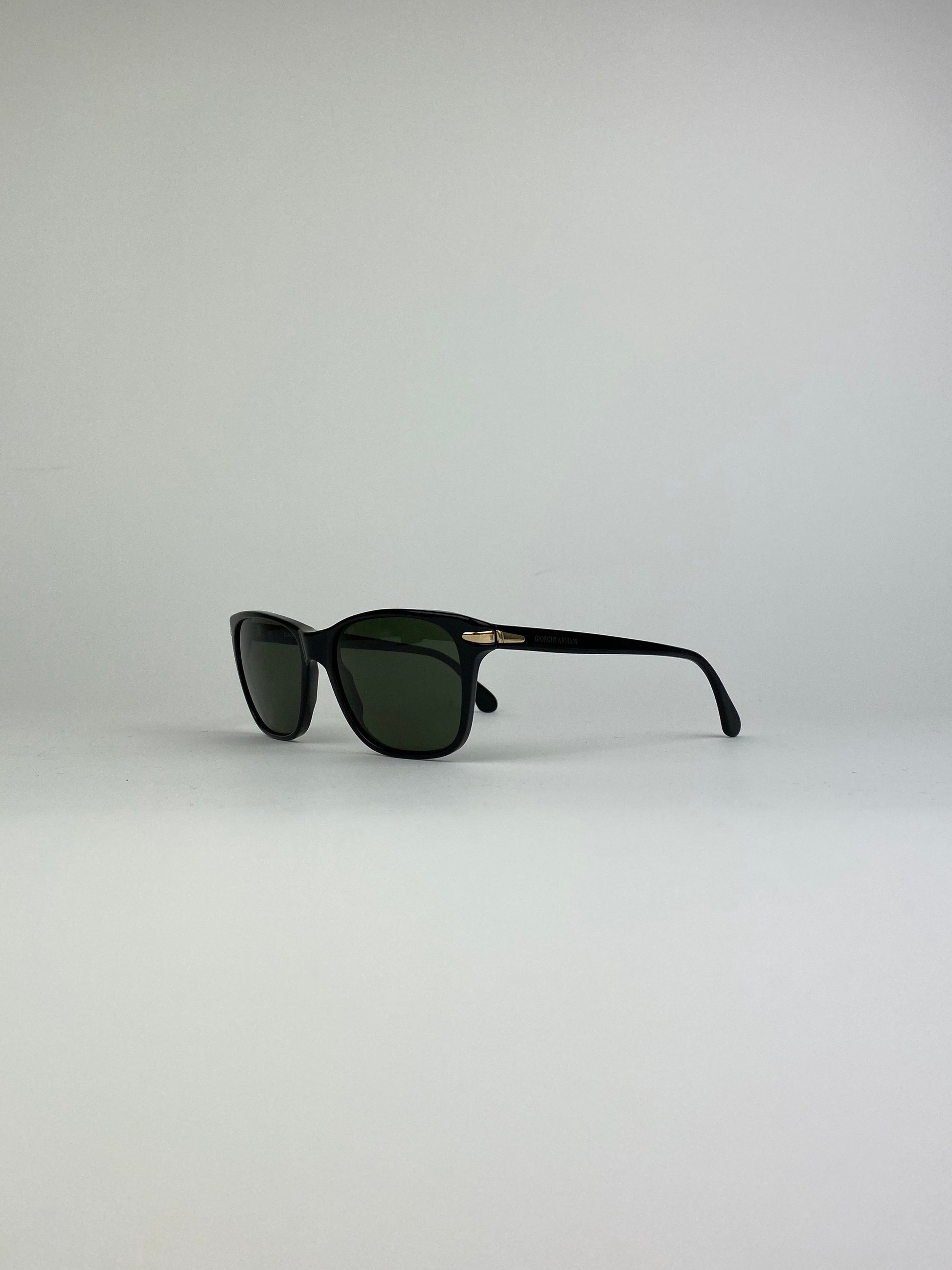 Black Giorgio Armani Wayfarer sunglasses with sleek frame and dark lenses, stylish and iconic eyewear for men and women.