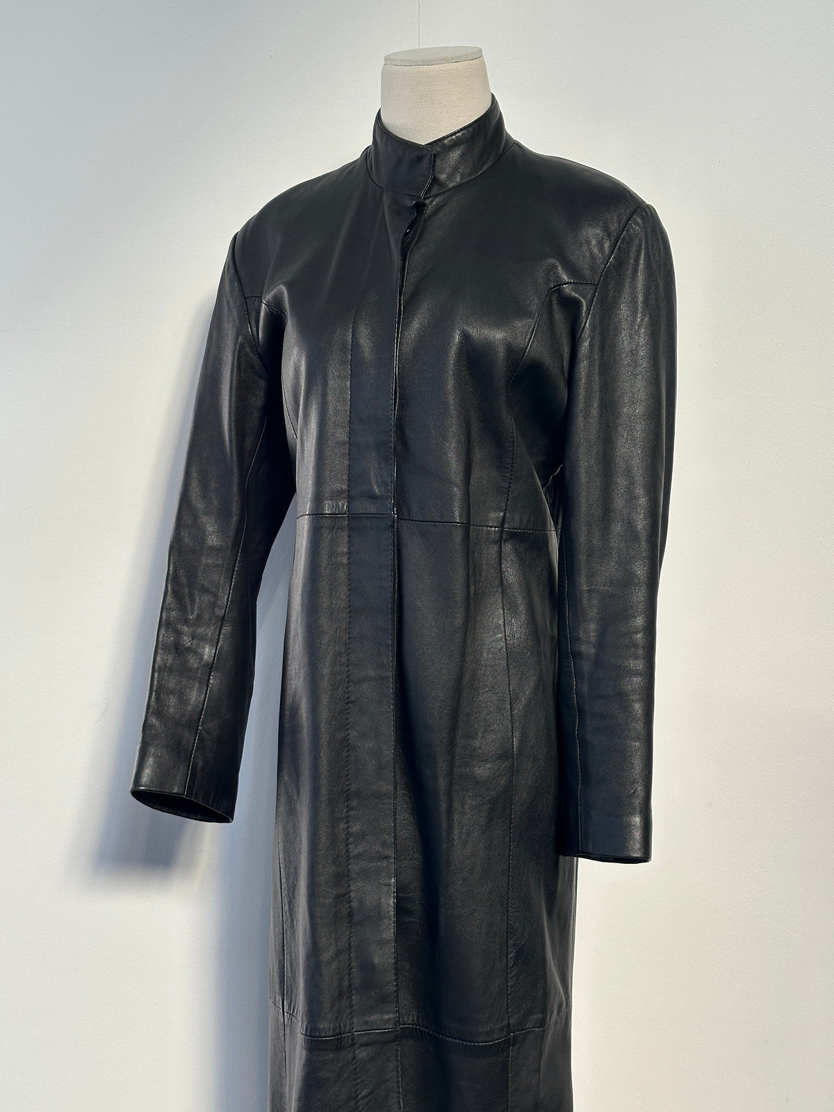 Vintage 1990s leather trench coat, floor length, size small, showcasing classic design and rich brown leather material.
