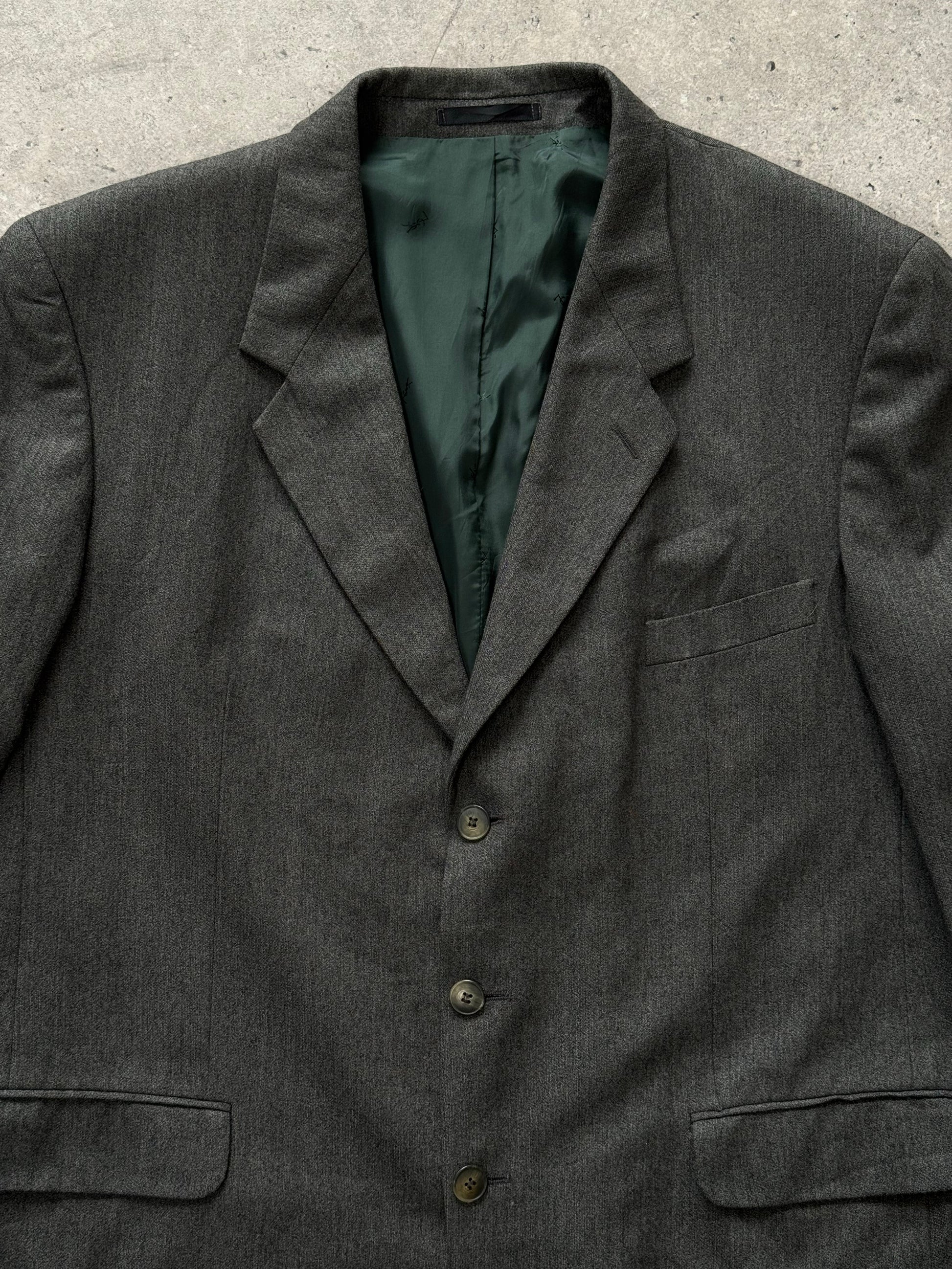Yves Saint Laurent Pour Homme 1990s pure wool single-breasted blazer in size 46R, shown on a hanger with front view.