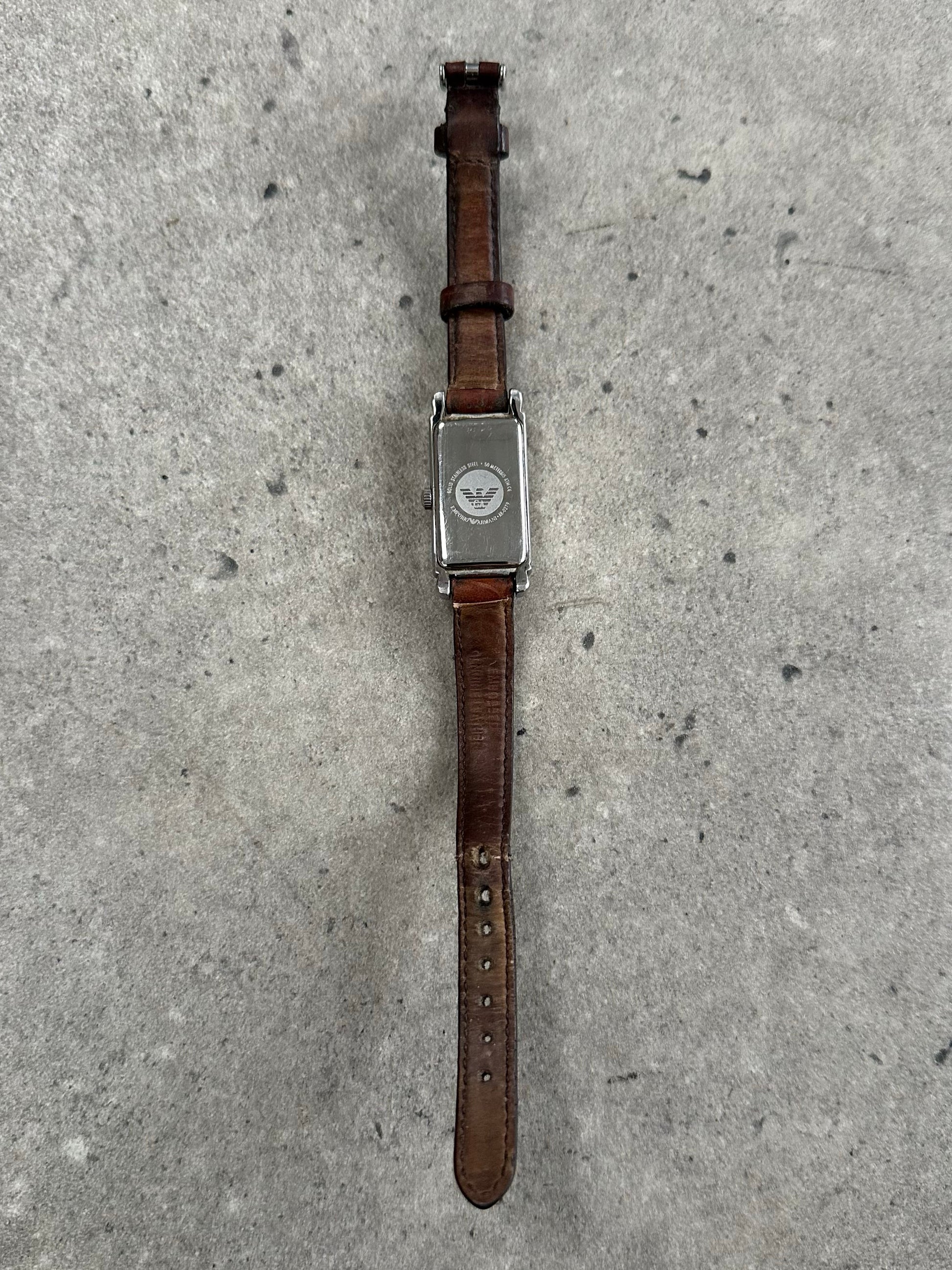 Emporio Armani 2000s leather watch with classic round dial and sleek black leather strap, stylish men's wristwatch.