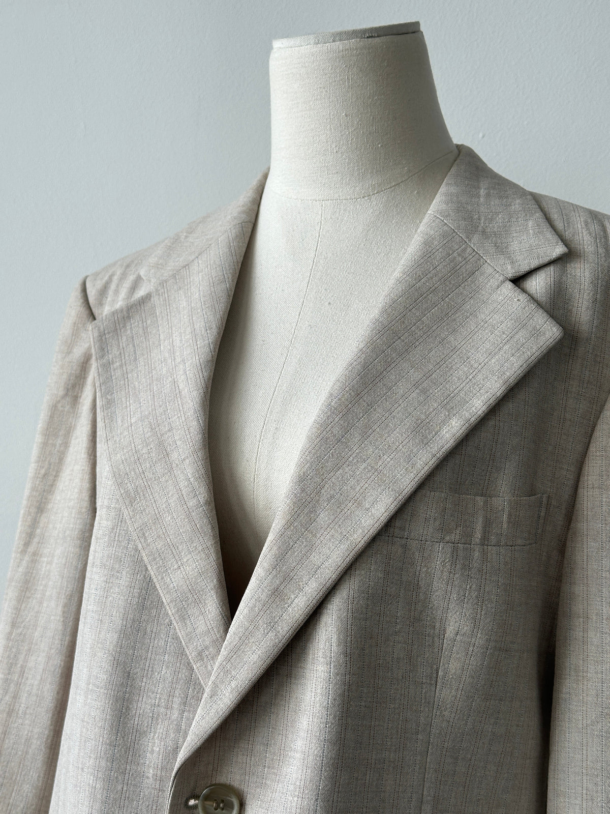Yves Saint Laurent 1980s wool striped single-breasted blazer, size M, featuring classic tailored fit and vintage design details.