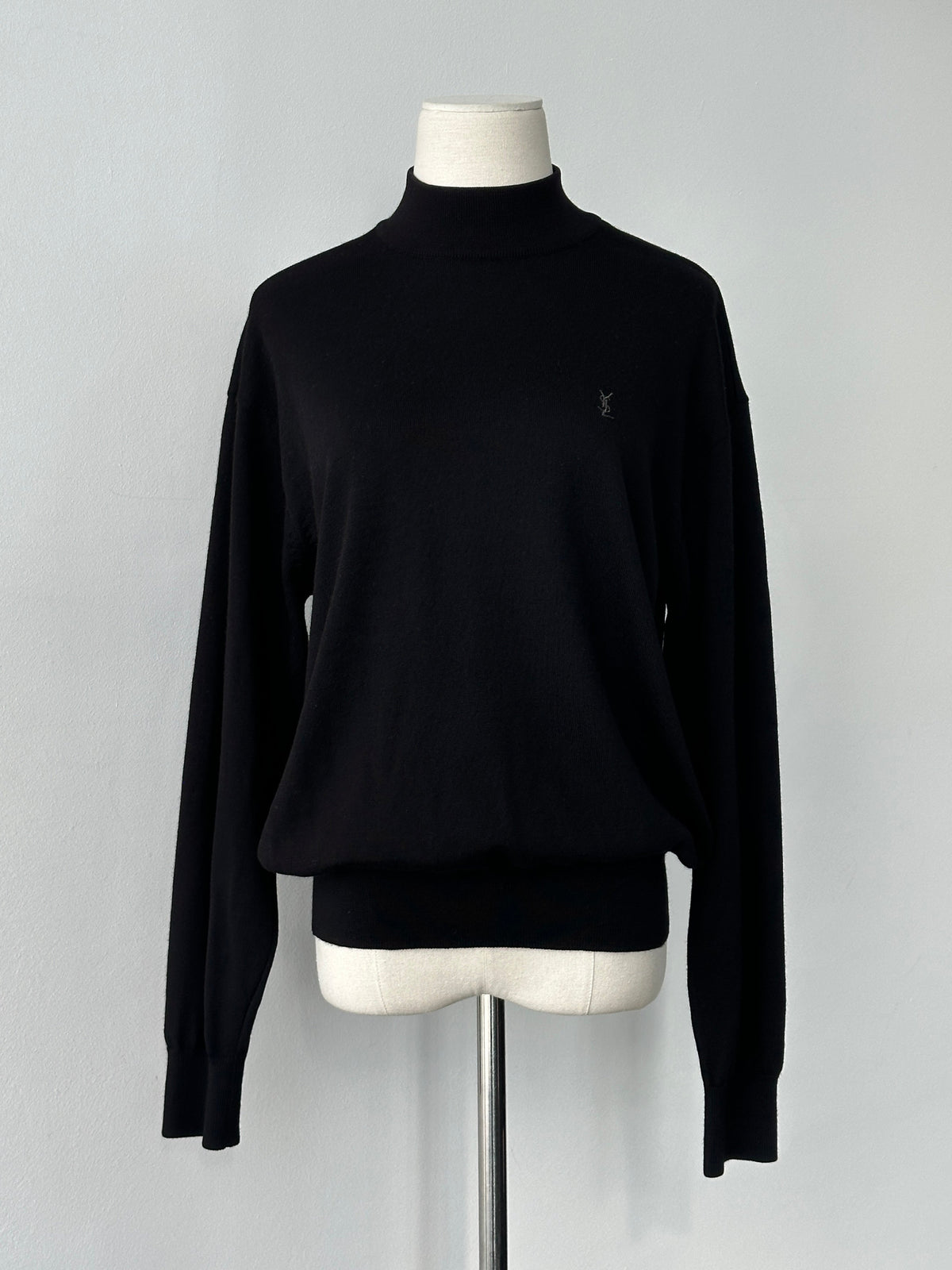 Yves Saint Laurent 1990s wool high neck jumper in size M, featuring a cozy knit design and classic silhouette.