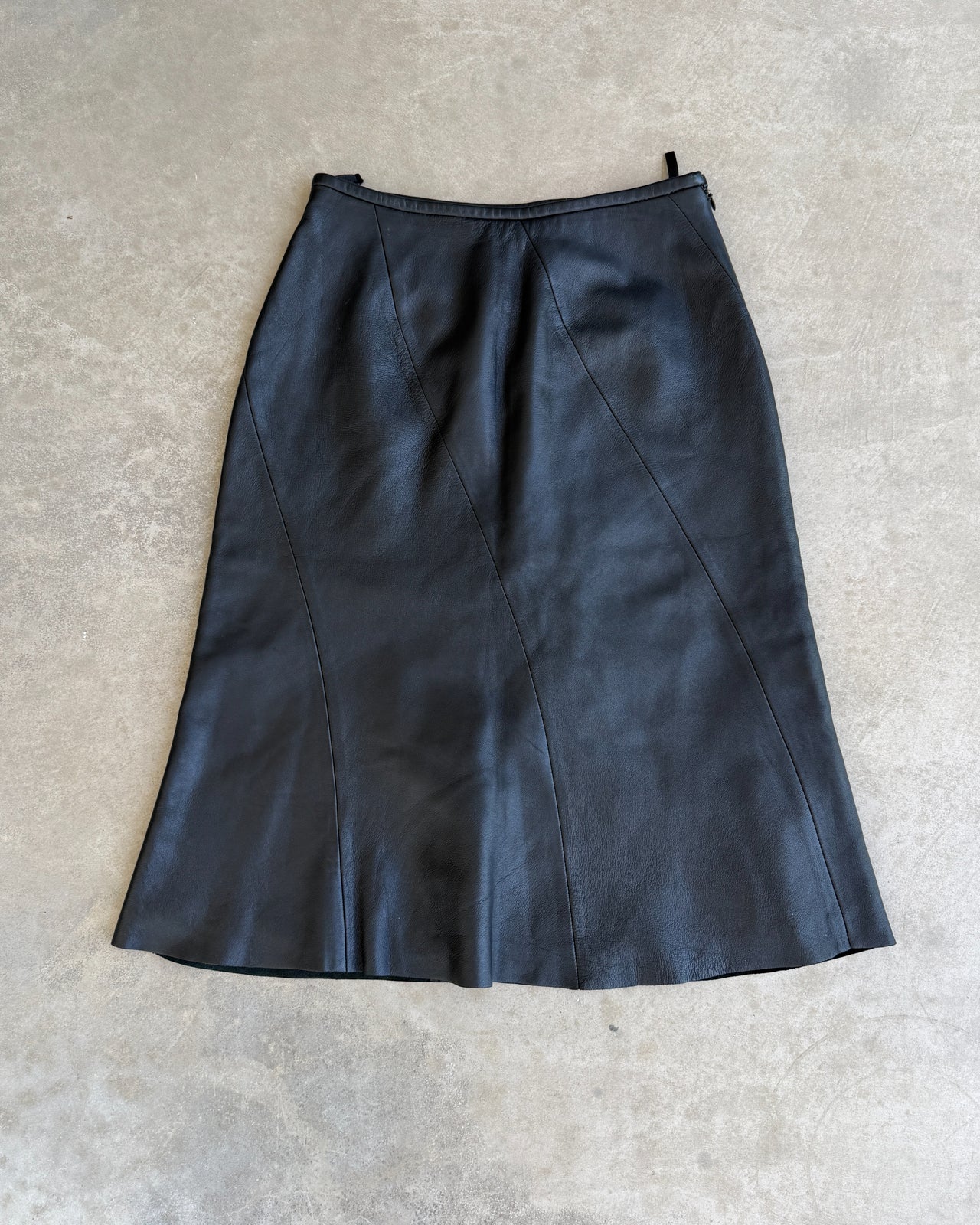 Armani Collezioni Leather Midi Skirt – XS-on a concrete background