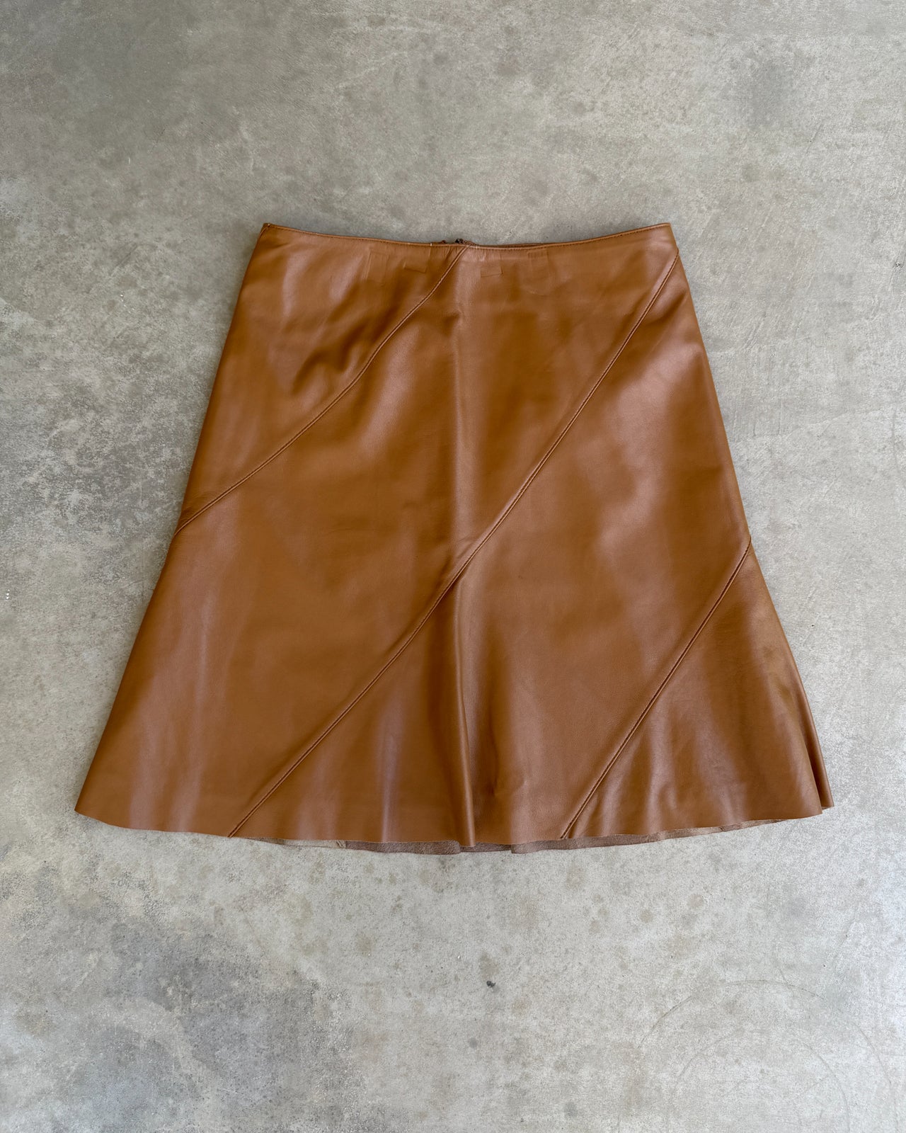 Burberry Blue Label Brown Leather Midi Skirt – XS/S-on a concrete background