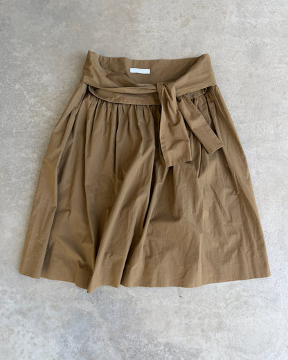 Chloé Cotton Wrap Tie Waist Midi Skirt-on a concrete background