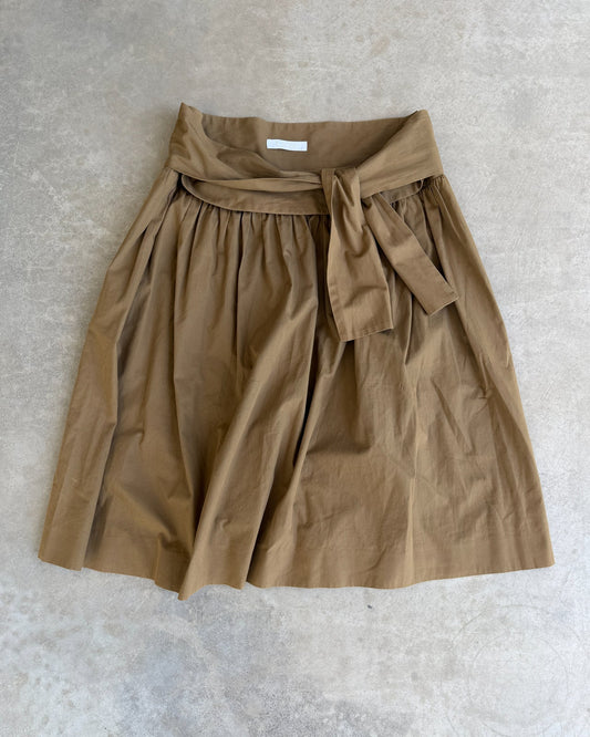 Chloé Cotton Wrap Tie Waist Midi Skirt-on a concrete background