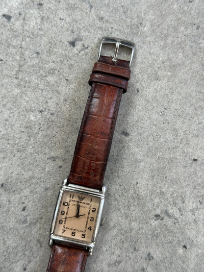 Emporio Armani 2000s leather rectangular quartz watch with silver dial and black leather strap, showcasing classic luxury style.