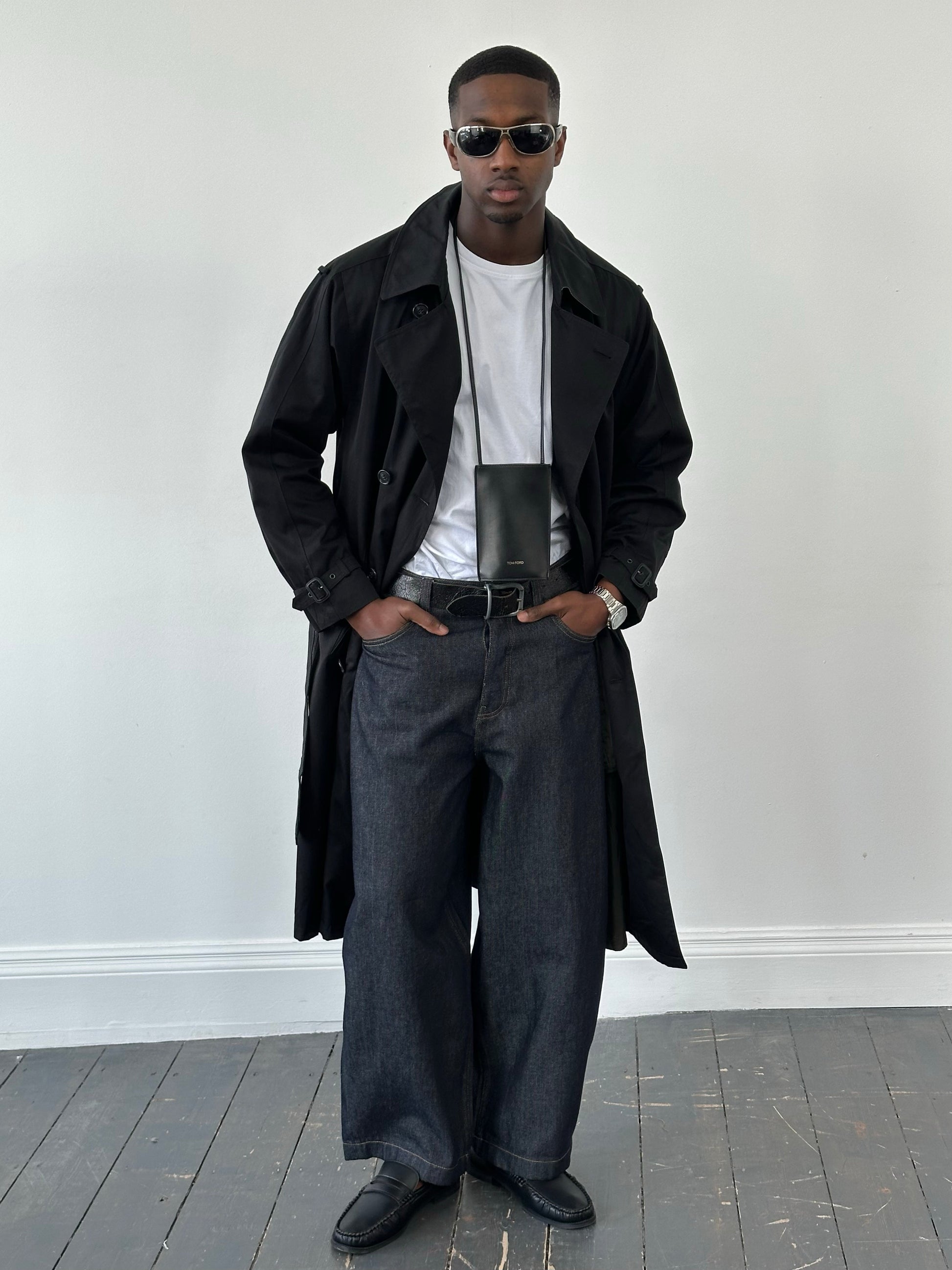 London Fog Towne 1990s double-breasted belted trench coat displayed on a model, classic beige color, mid-length style.