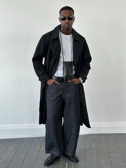 London Fog Towne 1990s double-breasted belted trench coat displayed on a model, classic beige color, mid-length style.