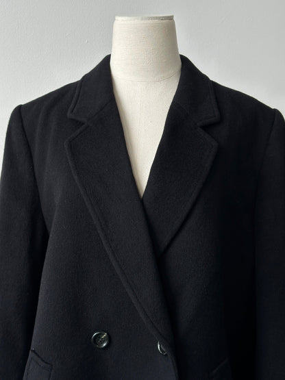 Vintage 1990s pure cashmere double-breasted coat in classic style, shown in beige with wide lapels and button details.