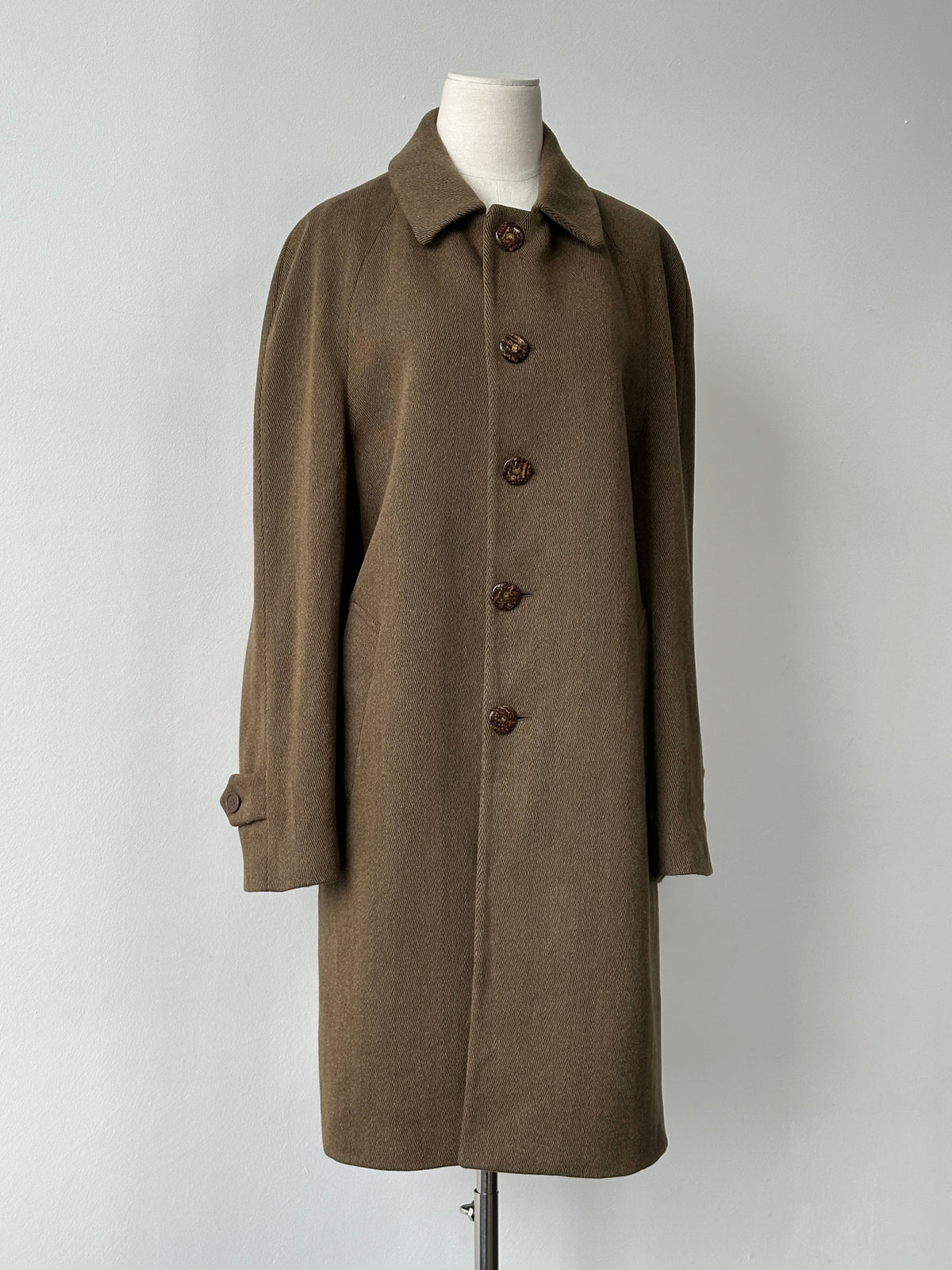 Vintage 1990s Italian wool herringbone coat, single-breasted design, size L, featuring classic tailored style.