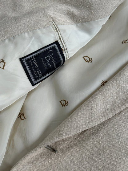 Christian Dior 1980s pure silk single-breasted blazer, cream color, tailored fit, classic 1980s vintage style, detailed fabric texture.