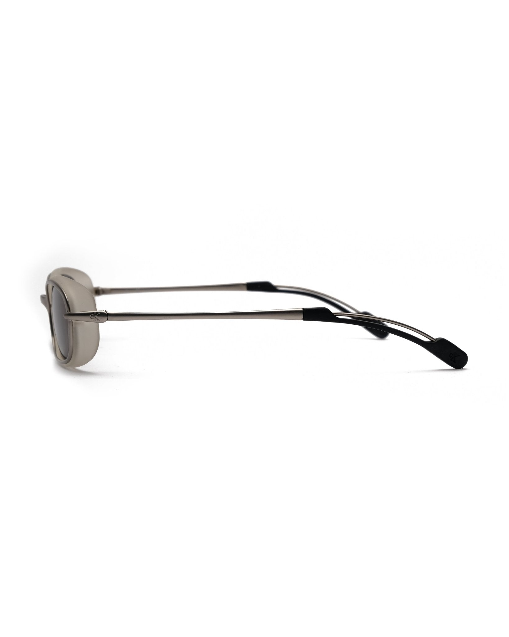 https://cdn.shopify.com/s/files/1/0818/5459/5398/files/calvin-klein-calvin-klein-sunglasses-vintage-su545-9760400.jpg?v=1784368356