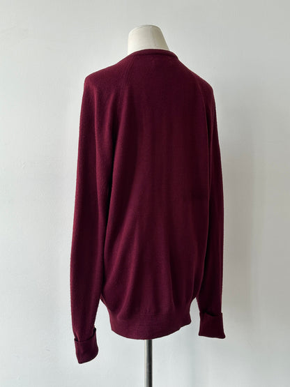 Christian Dior 1990s V-neck logo jumper in black, featuring the iconic Dior logo on the chest, size M, classic vintage style.
