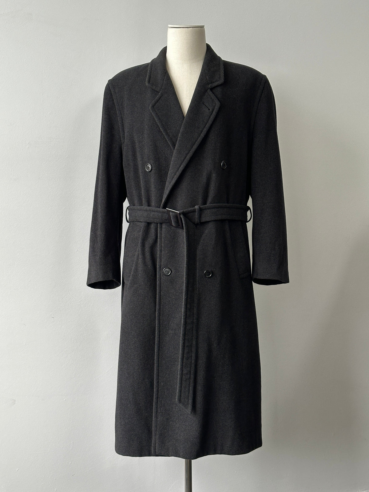 Vintage 1990s wool cashmere high neck belted coat, beige color, classic design, long sleeves, and belt at waist.