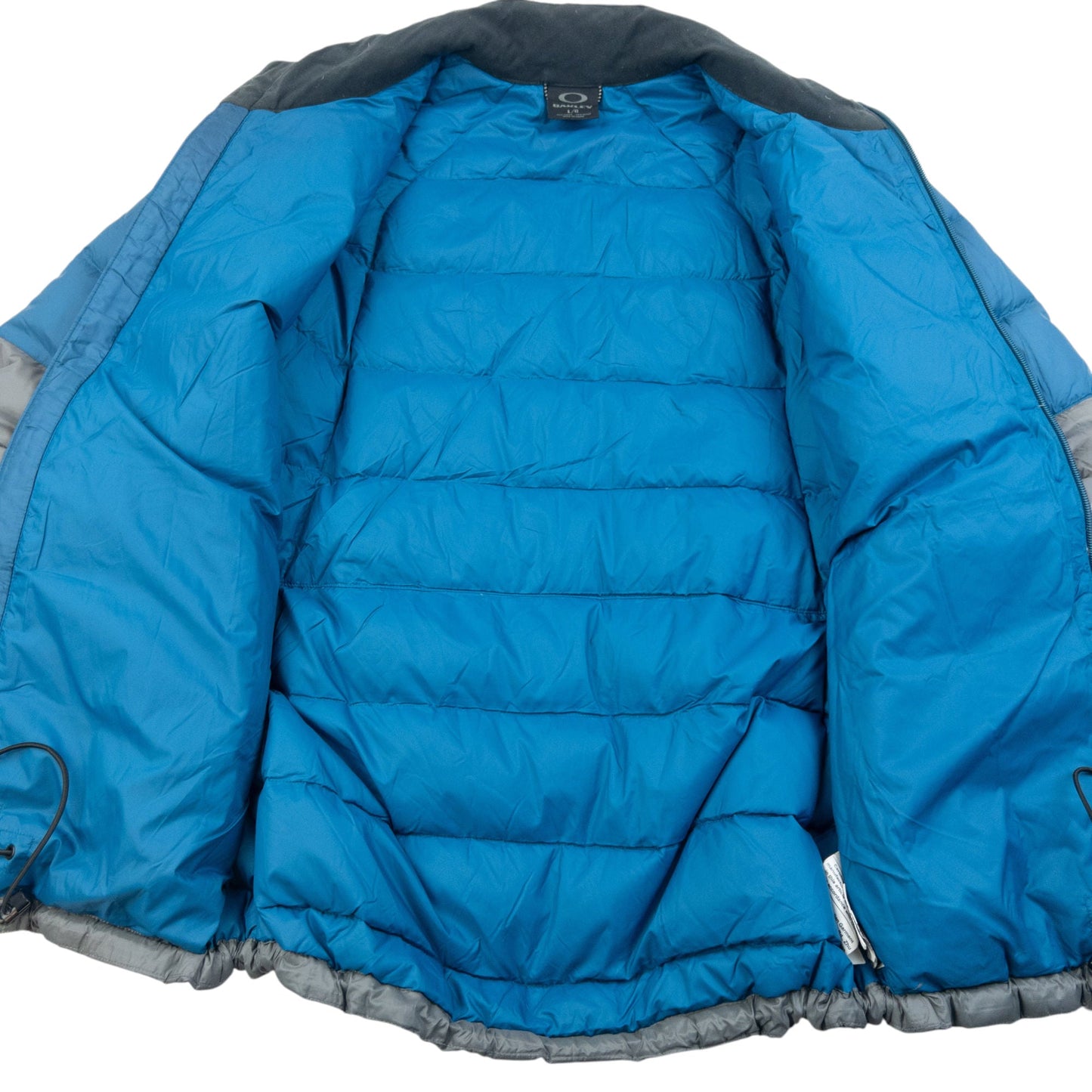 Vintage 2000s Oakley Zip Up Puffer Jacket Size L | Large, Blue