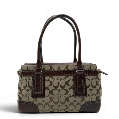 https://cdn.shopify.com/s/files/1/0564/9376/8855/files/coach-handtasche-tote-signature-beige-braun-large-canvas-vintage-y2k-look25.webp?v=1777462769