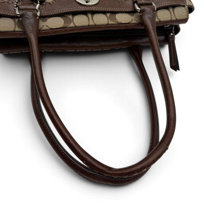 https://cdn.shopify.com/s/files/1/0564/9376/8855/files/coach-handtasche-tote-signature-beige-braun-large-canvas-vintage-y2k-look31.webp?v=1777462769