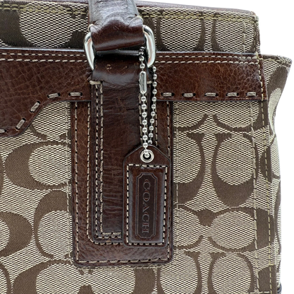 https://cdn.shopify.com/s/files/1/0564/9376/8855/files/coach-handtasche-tote-signature-beige-braun-large-canvas-vintage-y2k-look32.webp?v=1777462770